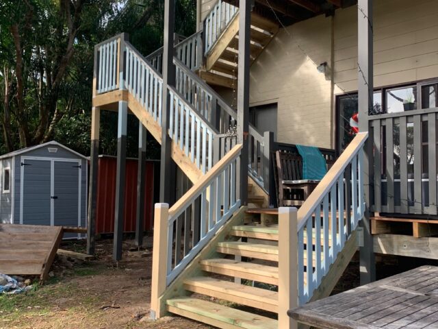 Two-flight timber exterior stairs and balustrade to upper deck, backyard renovation.